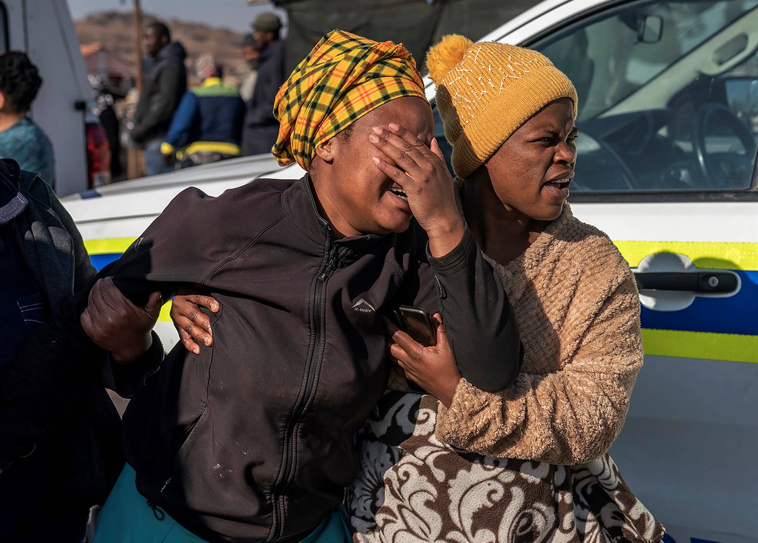 A woman weeps at the scene of a massacre at the Mdlalose’s Tavern in Orlando East, Soweto.