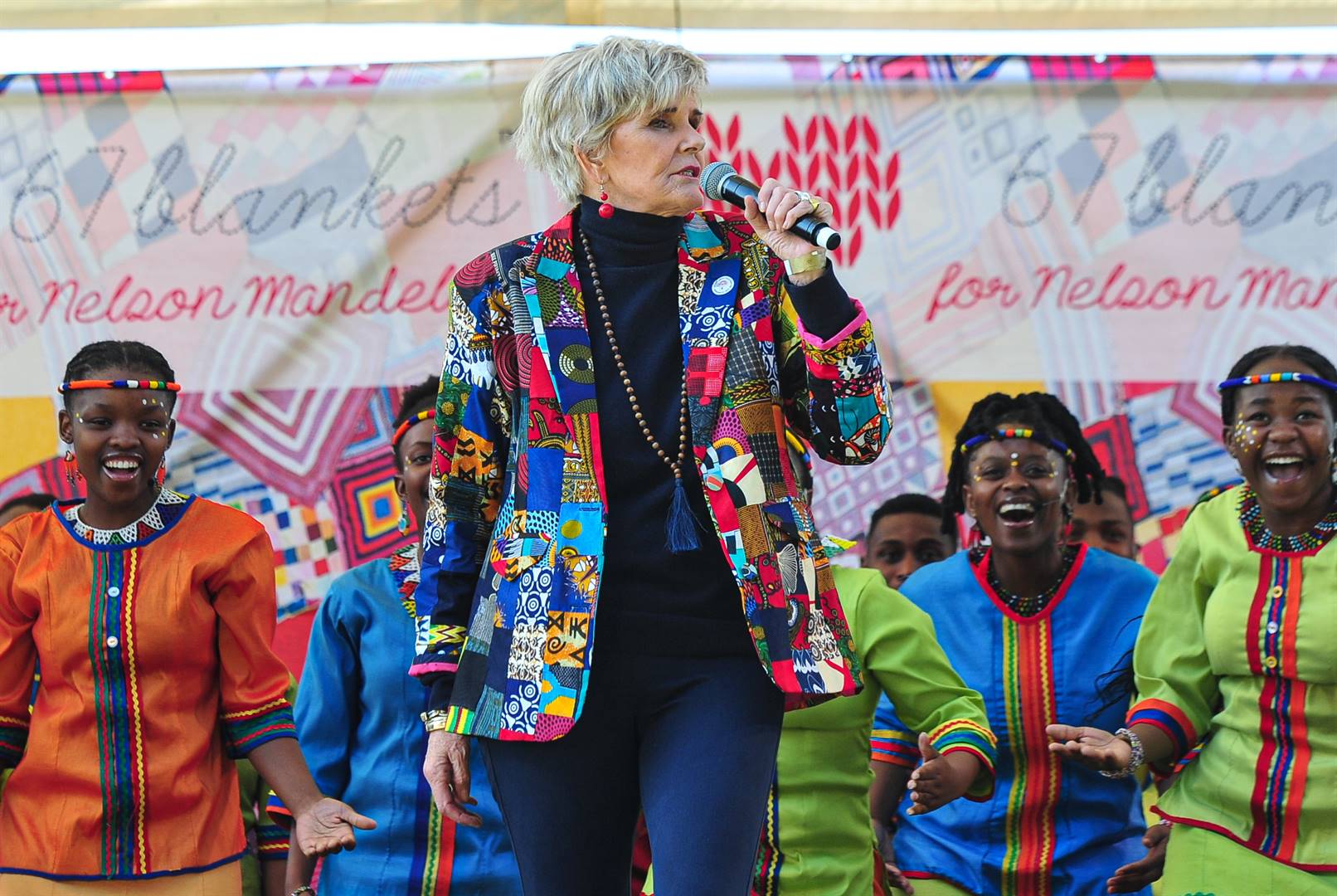 The legendary musician PJ Powers performed the song Bayete with the Mzanzi Youth Choir perform at the blankets reveal event. Mzansi Youth Choir performed a new song dedicated to the humanitarian organisation the Gift of the Givers, health workers and the 67 Blankets for Nelson Mandela Day organisation at the reveal event at Steyn City in Midrand. Photo: Rosetta Msimango