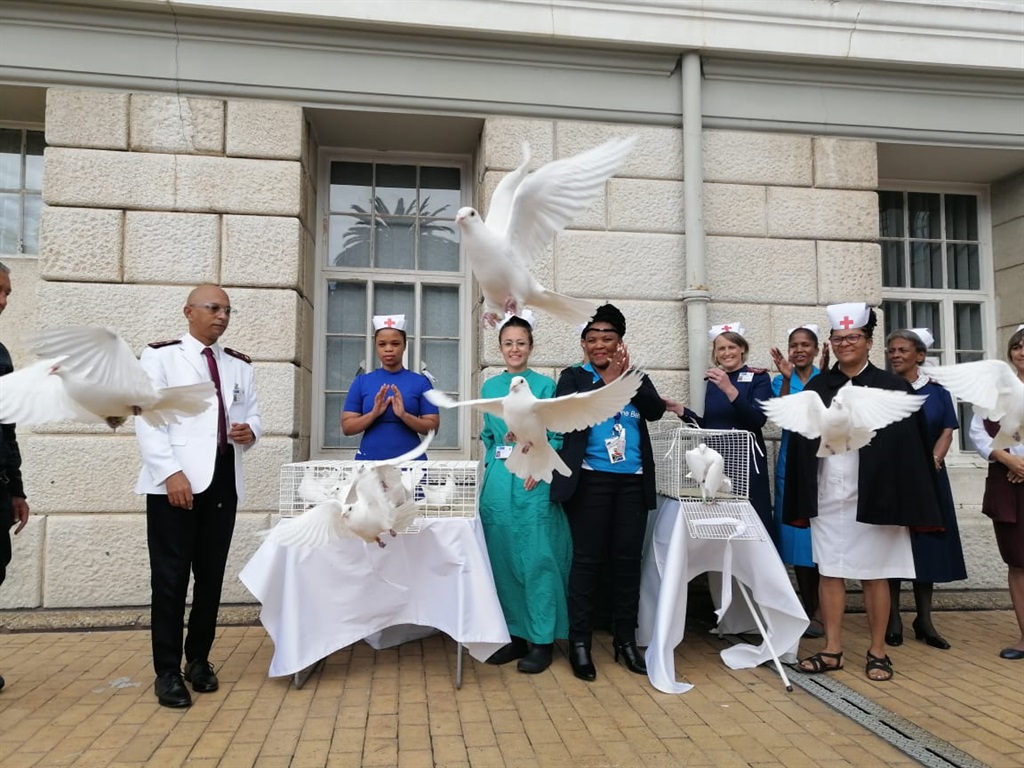 Healthcare workers at Groote Schuur Hospital free doves to commemorate International Nurses Day (Thursday 12 May).
