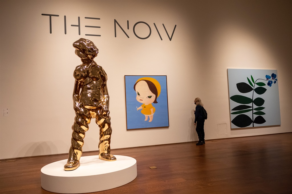 'Grober Geist Nr. 1' by Thomas Schütte in front of 'Nice to See You Again' by Yoshitomo Nara is on display during a press preview of The Now at Sotheby's on November 05, 2021 in New York City. The various auctions will be held throughout November. (Photo by Alexi Rosenfeld/Getty Images)
