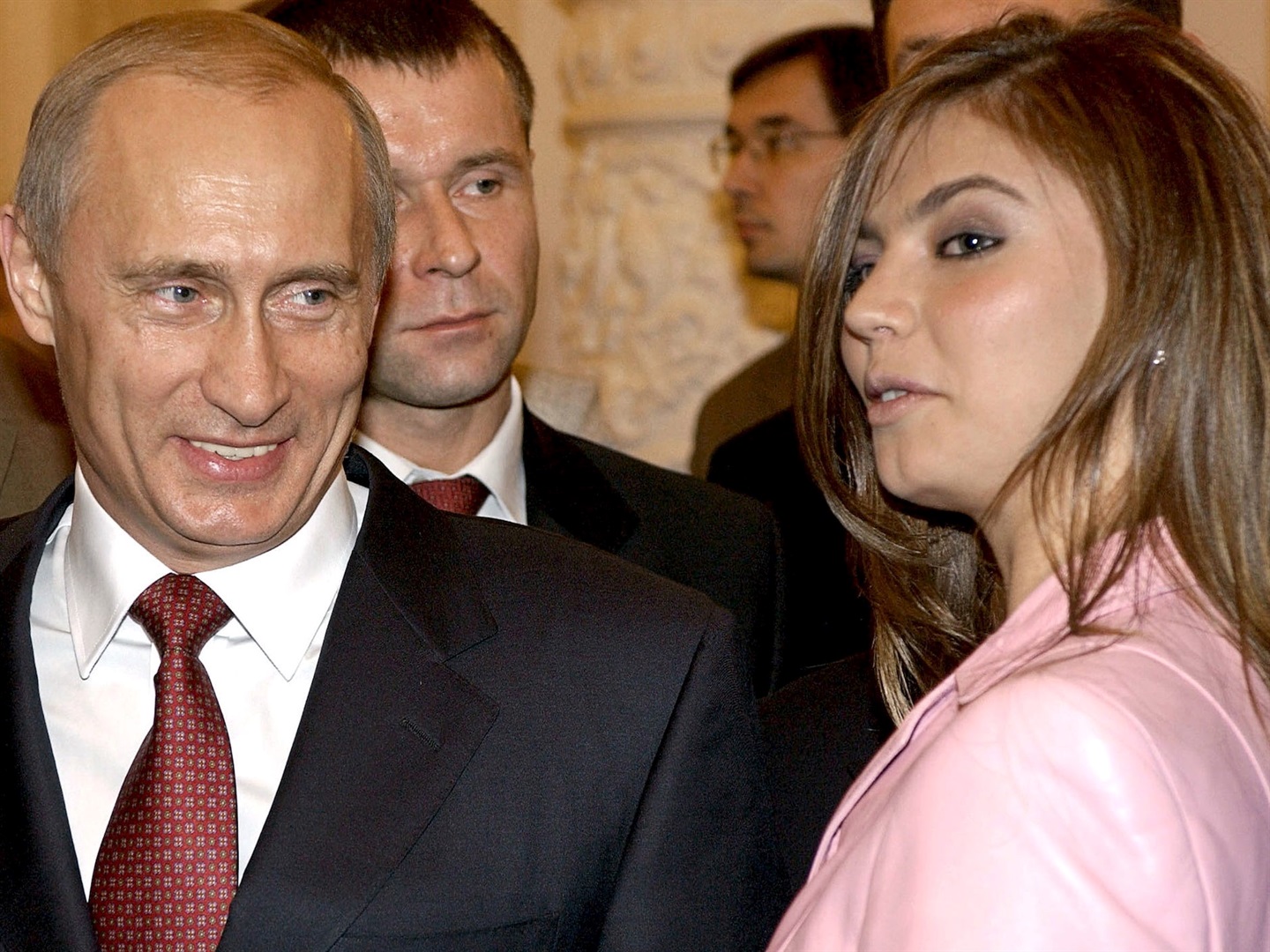 Russian President Vladimir Putin (L) smiles next to Russian gymnast Alina Kabaeva in 2004. REUTERS/ITAR-TASS/PRESIDENTIAL PRESS SERVICE