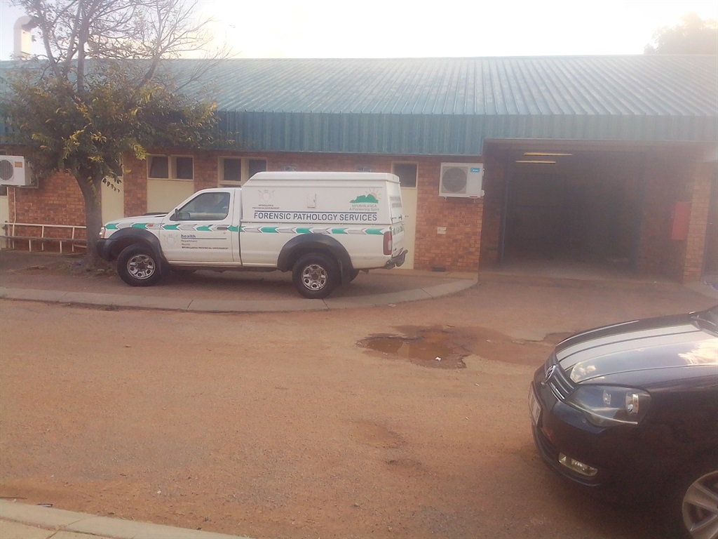Some patients who collect medication at KwaMhlanga Hospital’s pharmacy in Mpumalanga alleged they are affected by seeing dead bodies of people being delivered and collected at this open door of the mortuary.