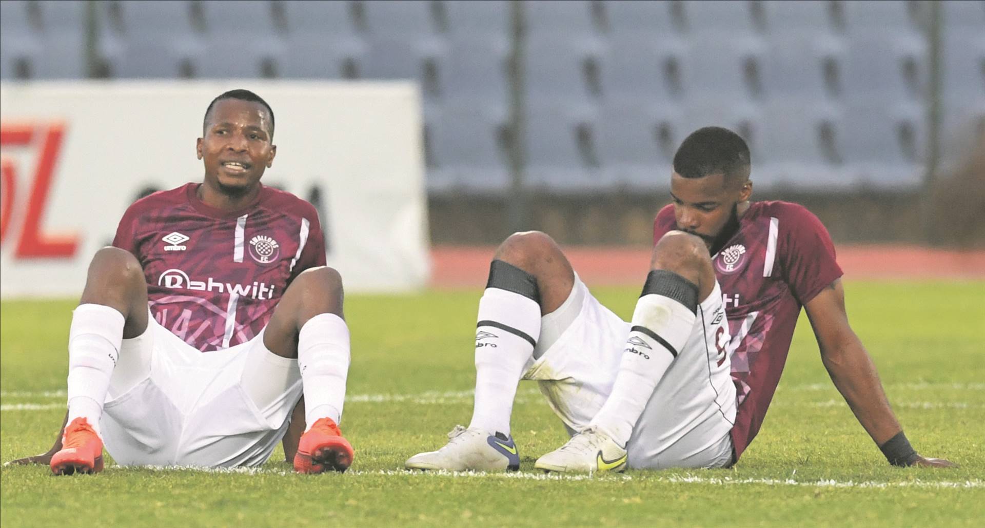 Swallows players Thabo Mosadi and Wandisile Letlabika react to the final whistle of their DStv Premiership match against Chippa United in Dobsonville, Soweto Photo: Sydney Seshibedi / Gallo Images