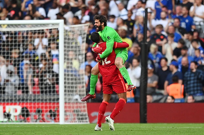 Alisson Becker and Joel Matip of Liverpool celebrate. (Photo by Shaun Botterill/Getty Images)