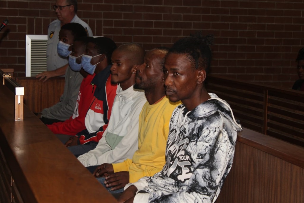 The six men accused of allegedly killing Amakhosi defender Luke Fleurs are in the dock awaiting to apply for bail in the Roodepoort Magistrate Court. Photo by Phuti Mathobela