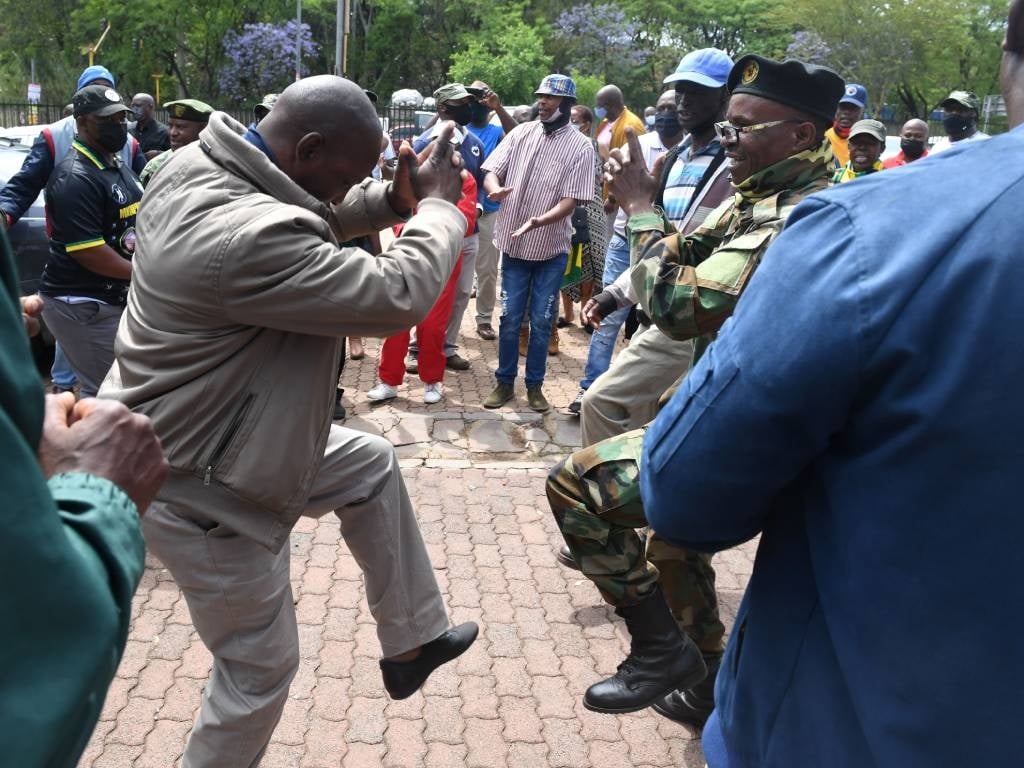 Military veterans dance during the court appearance of some of their members at Kgosi Mampuri Correctional Services Prison Court. It is reported that the accused were arrested after they allegedly held Defence and Military Veterans Minister, Thandi Modise, her deputy Thabang Makwetla and Minister in the Presidency Mondli Gungubele hostage at the St George's Hotel in Pretoria.