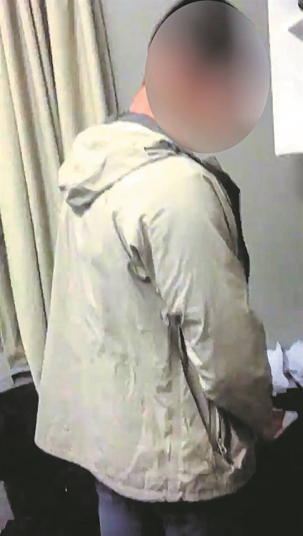 A screengrab from a video showing a mlungu student urinating all over a black first-year student’s room.