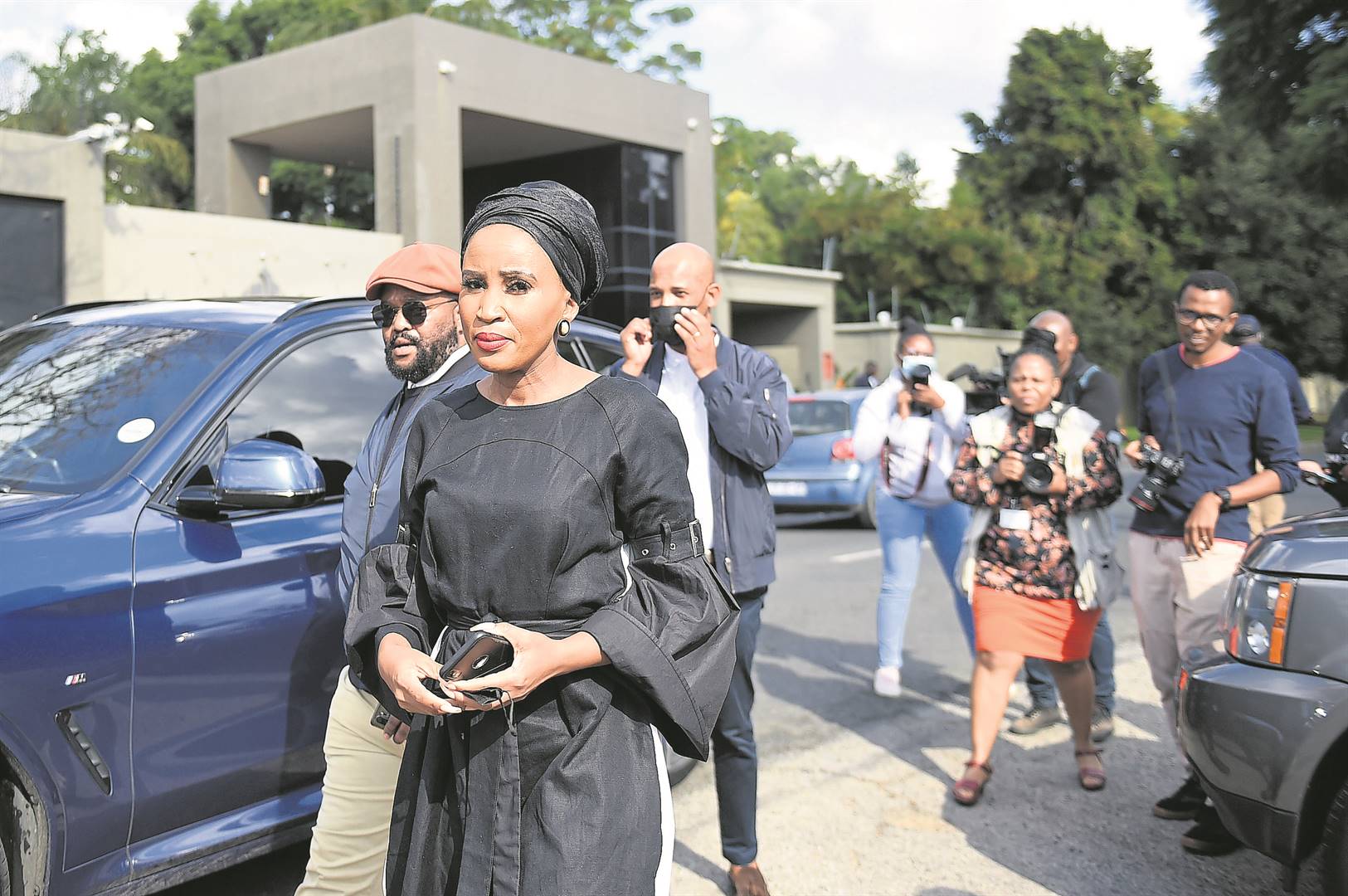 Mayor Mpho Phalatse was among the leaders who visited the late Mpho Moerane’s family yesterday to convey their condolences, where spokesman Mike Maile (inset) provided details for both the memorial service and funeral.             Photos by Christopher Moagi