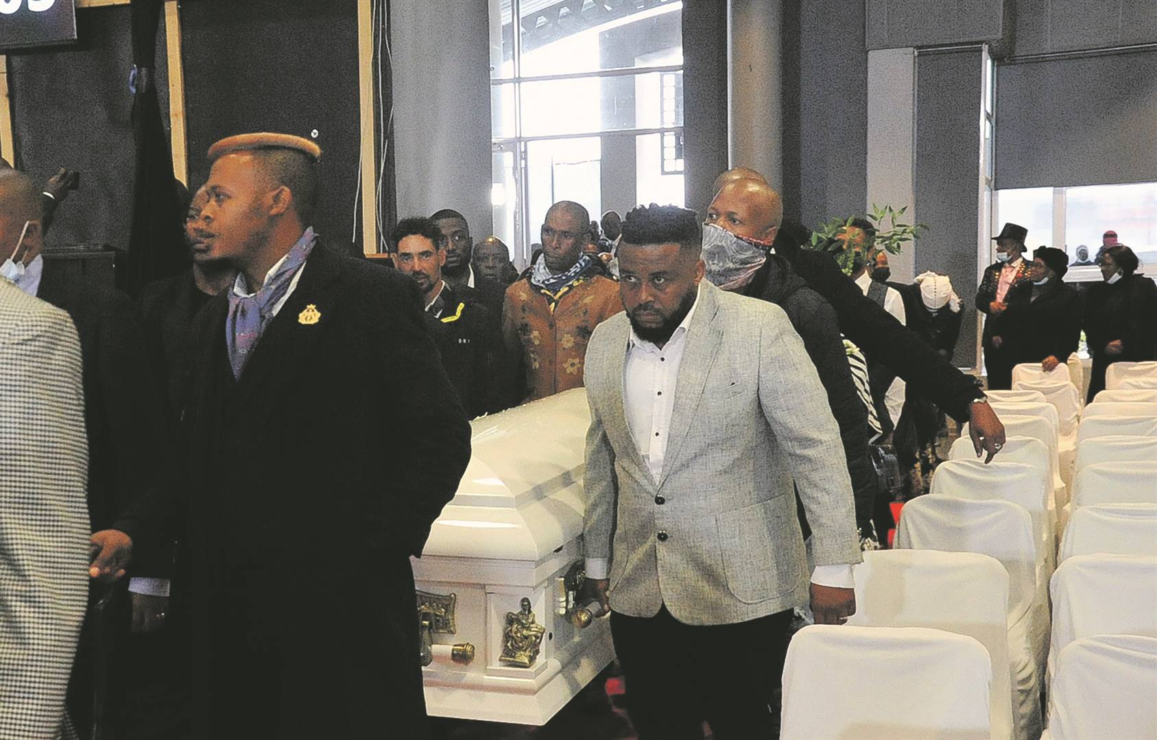 Pallbearers carry the coffin of Deborah Fraser during her funeral service on Saturday.        Photo by Jabulani Langa