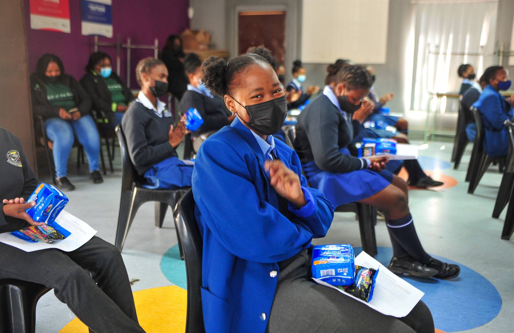 Three organisations team up to alleviate 'period poverty' by donating  sanitary pads to pupils