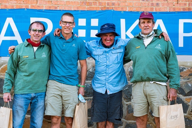 Race founder, Farmer Glen, with some of the event’s very committed Black Mambas. (Photo: Sani2C)