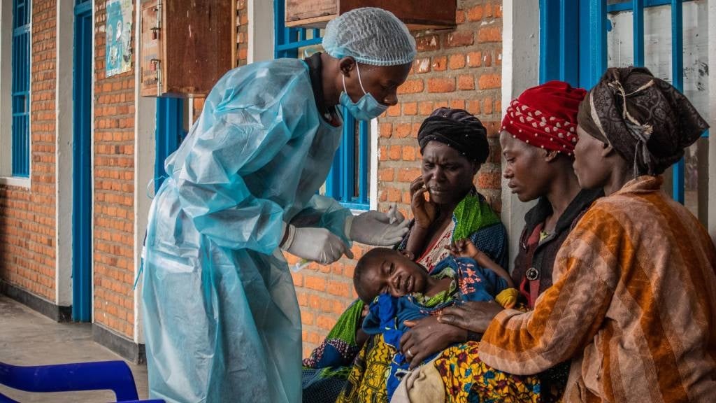 A child receives medical attention at a health centre in Kanyaruchinya after taking refuge there while fleeing conflict between the Armed Forces of the Democratic Republic of the Congo (FARDC) and M23 (March 23 Movement) in the territory of Rutsuru in the DRC. 