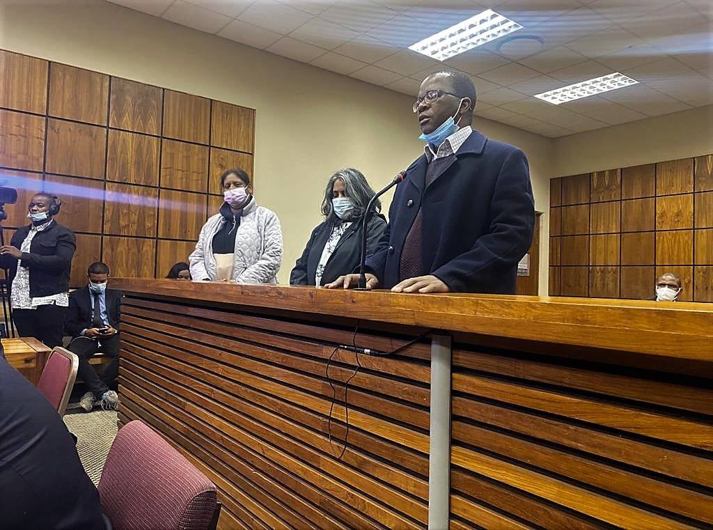 Ronica Ragavan, Pushpaveni Ugeshni Govender and Joel Raphela during their first appearance at the Randburg Magistrate's Court. 