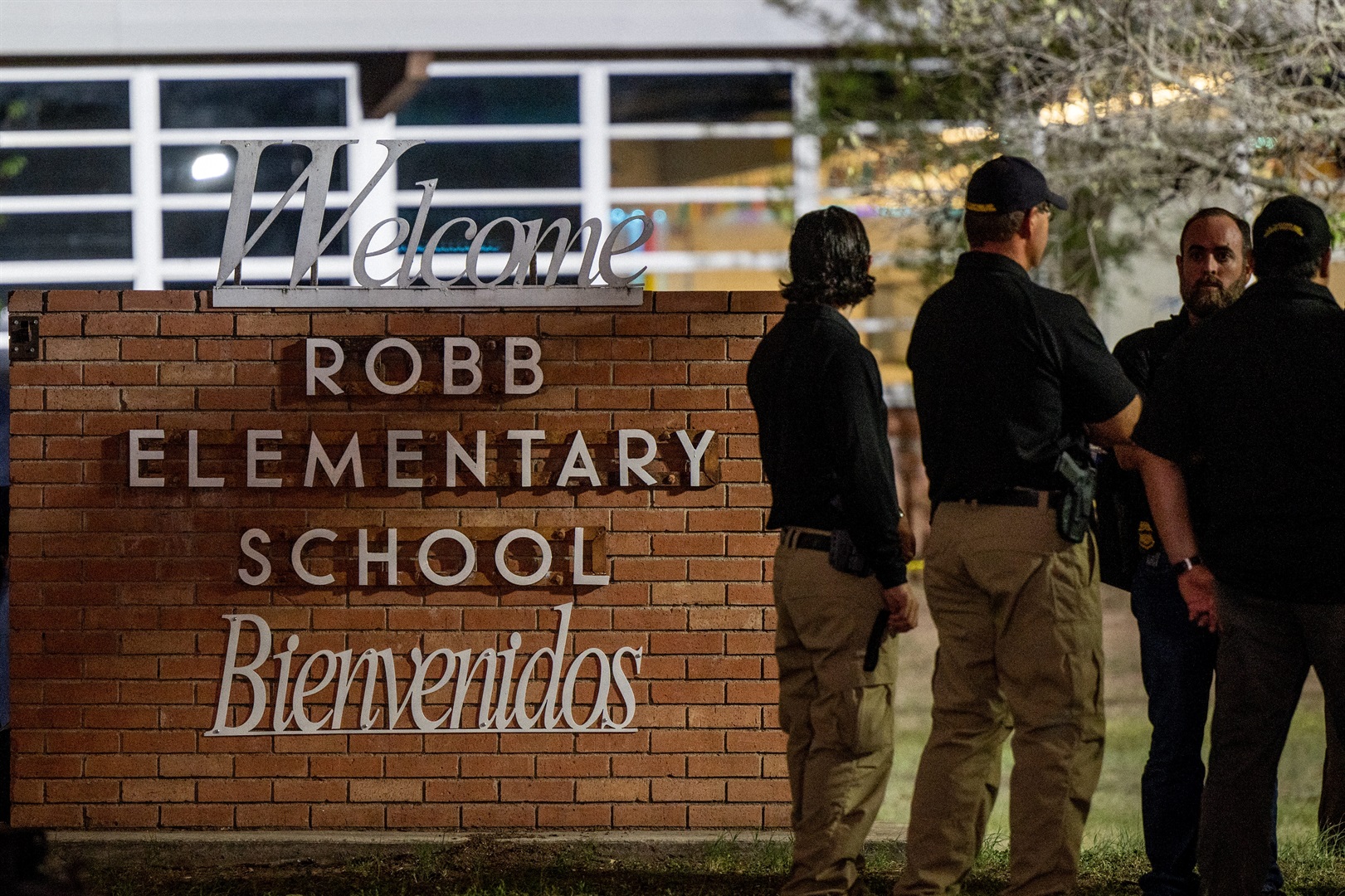 Law enforcement officers outside Robb Elementary School following a mass shooting.