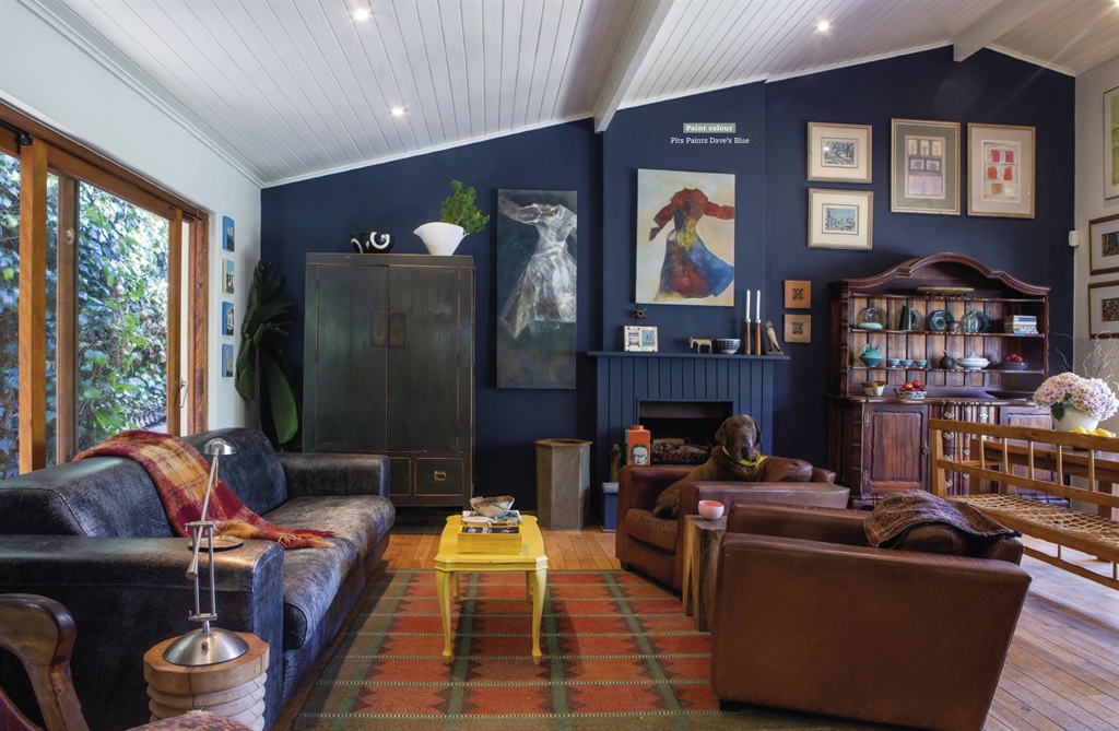 The chunky leather sofa is ideal for this space. “We have large dogs, so the furniture has to be pet-friendly,” says Errieda. The antique cabinet that houses the TV is a “dark British green”. “I’ve resisted the temptation to paint it for years. Its weathered state is part of its story.”