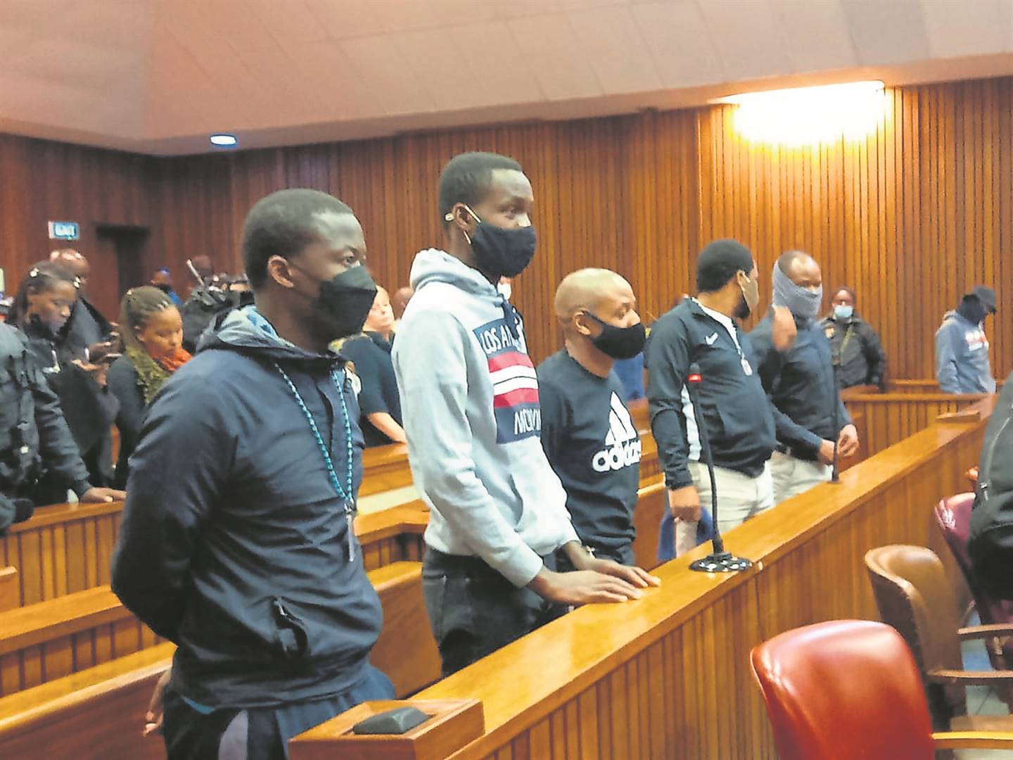 The accused, Muzikawukhulelwa Sibiya, Bongani Ntanzi, Mthobisi Mncube, Mthokoziseni Maphisa and Sifisokuhle Ntuli appear in the Pretoria North Gauteng High Court in Tshwane.                                        Photo by Aaron Dube