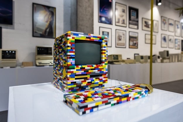 A Macintosh computer made with lego bricks is on d