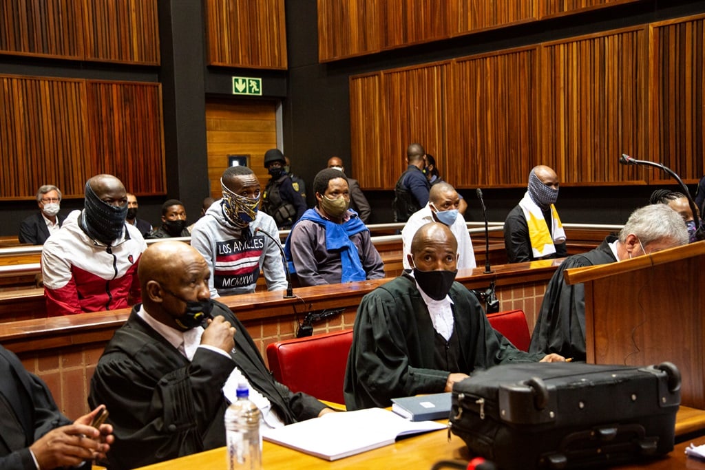Muzikawukhulelwa S’Tembu Sibiya, Bongani Sandiso Ntanzi, Mthobisi Prince Mncube, Mthokoziseni Ziphozonke Maphisa, and Sifisokuhle Sifiso Nkani Ntuli in court in October 2021.