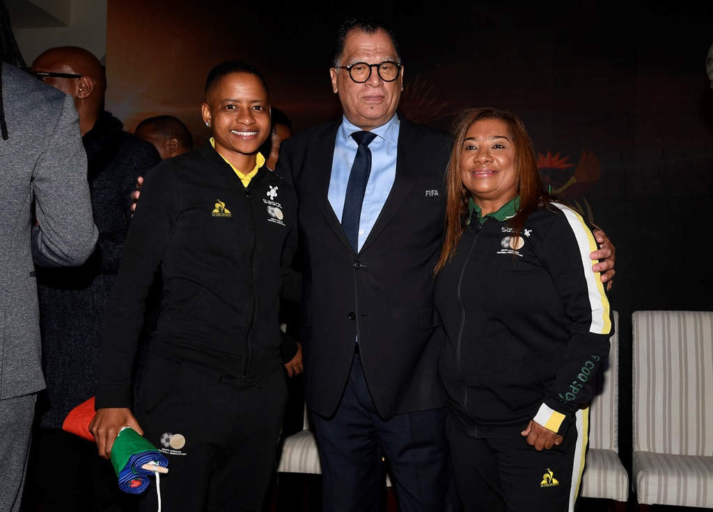 Refiloe Jane,Danny Jordaan and Desiree Ellis during the South Africa womens national soccer team squad announcement and send-off.