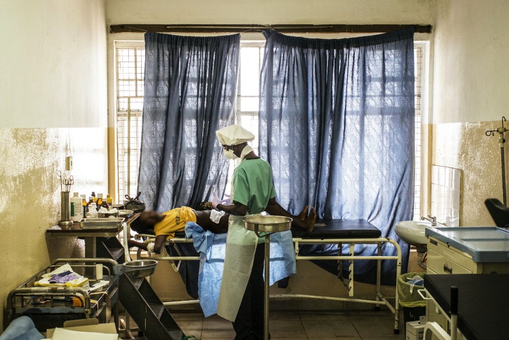A young mother receives a post-Cesarean dressing at the Princess Christian Maternity Hospital in Freetown on 25 April 2016. With the hospital's head nurse as her sole guardian, she will have to face the complications of an early pregnancy and the difficulties of a complex journey back to school.