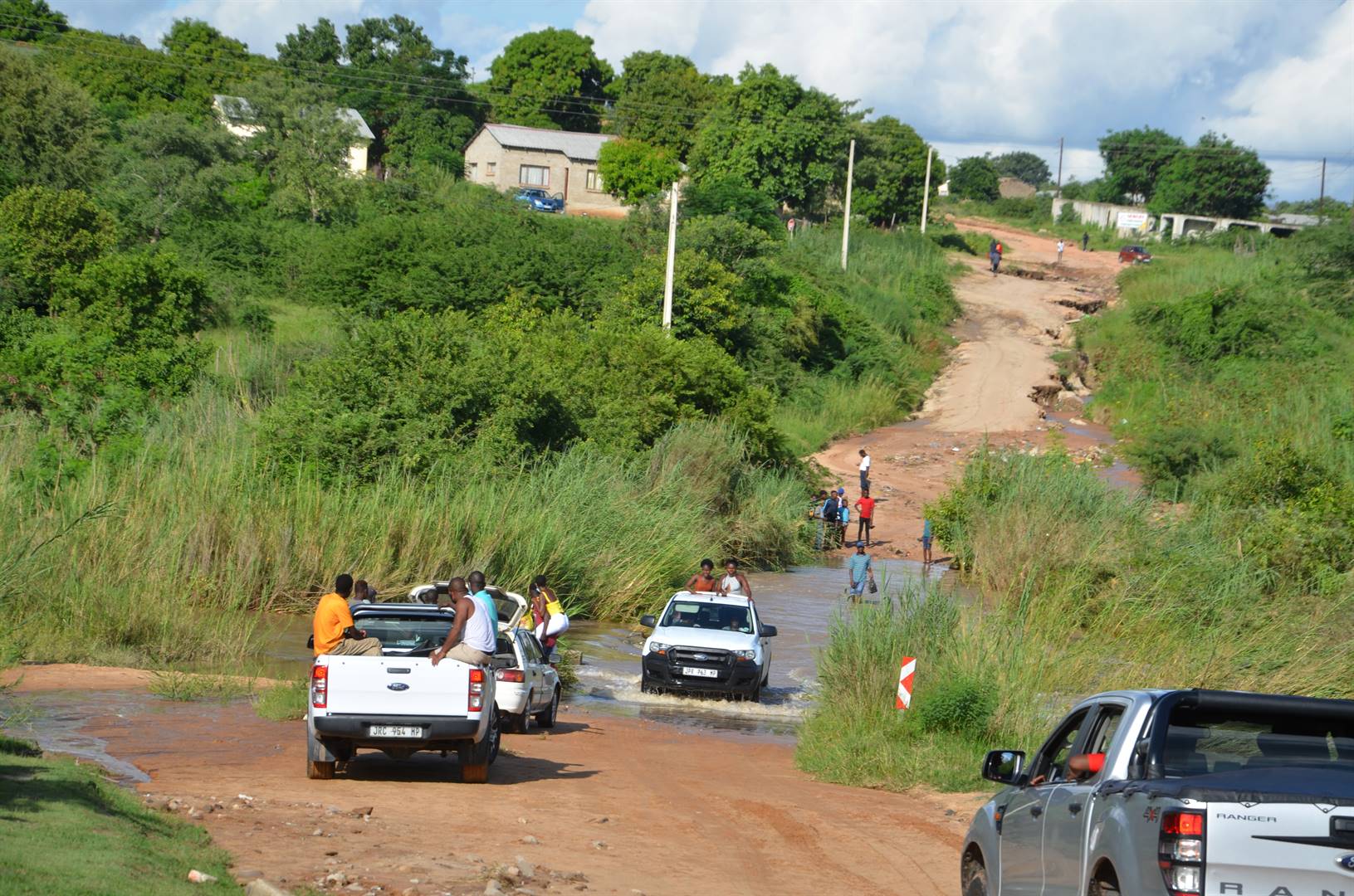 A new bridge will be built to replace the low-lying one at the deadly Mutlumuvi River, that cuts through Kumani and Thulamahashe.Inset MEC Mohita Latchminarain said the project has been handed over to the contractor.          Photo by Oris Mnisi