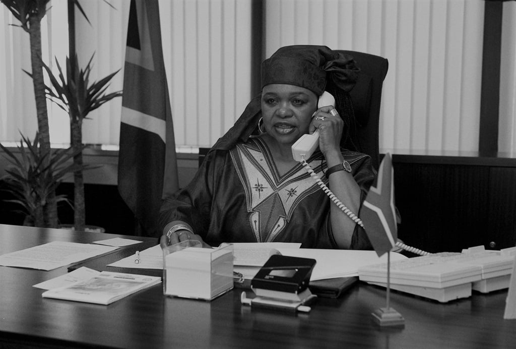 Lindiwe Mabuza is on the phone at her desk during an interview. (Photo by Nicole Maskus / picture alliance via Getty Images)