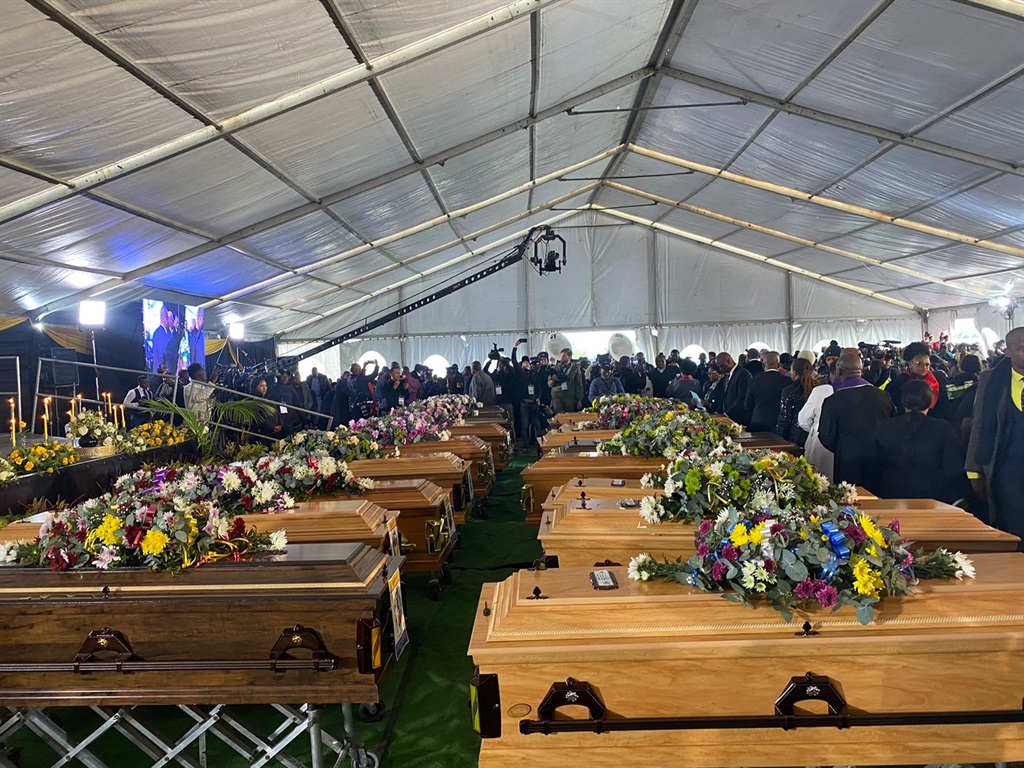 A mass funeral for 21 victims of Scenery Park  tarven tragedy is underway in East London. Photo: Siphokazi Totyi