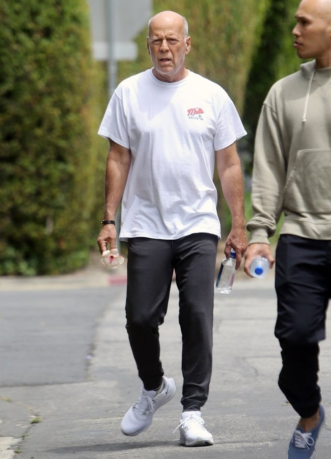 Bruce's trainer accompanied him on his exercise se