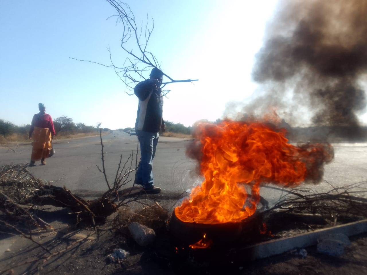Residents of Marikana and M1 near Soutpan in Hammanskraal blocked roads with burning tyres and rocks demanding MMC for Human Settlement, Abel Tau, to come and address them. Photo by Raymond MorarePhoto by 
