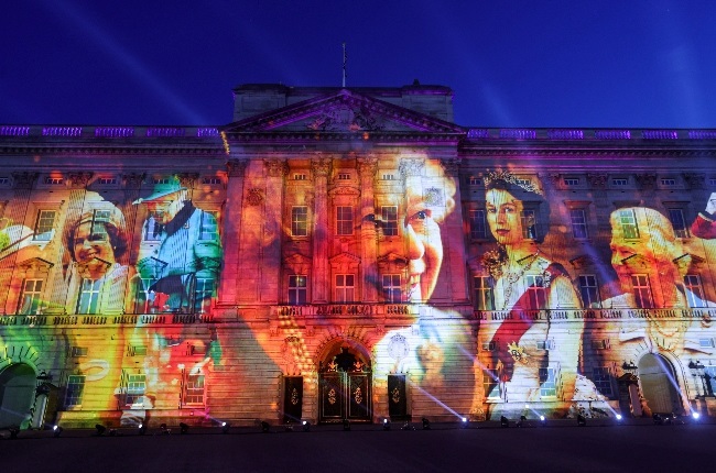 A montage of pictures of the queen were projected onto the palace walls. (PHOTO: Gallo Images/Getty Images)