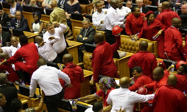 Security personnel remove EFF MPs out of Parliament during SONA in 2017. (Esa Alexander/Gallo Images / The Times)