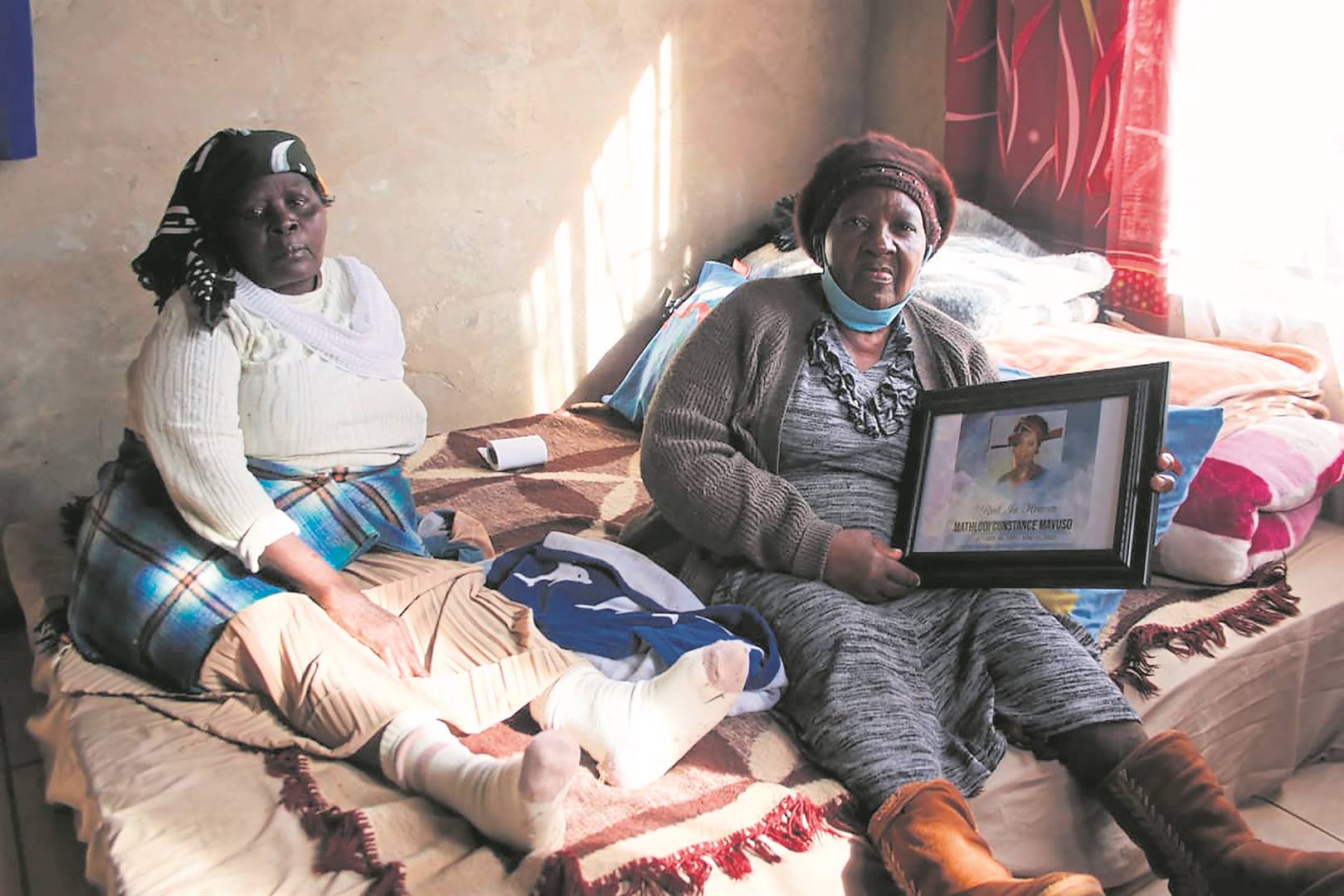 Sesi Mavuso and Elizabeth Gumbo are mourning the death of Mahlodi Mavuso (inset), who was allegedly killed by her son.           Photo by Phineas Khoza