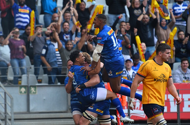 Evan Roos of Stormers celebrates scoring a try with team-mates.(Photo by Grant Pitcher/Gallo Images)