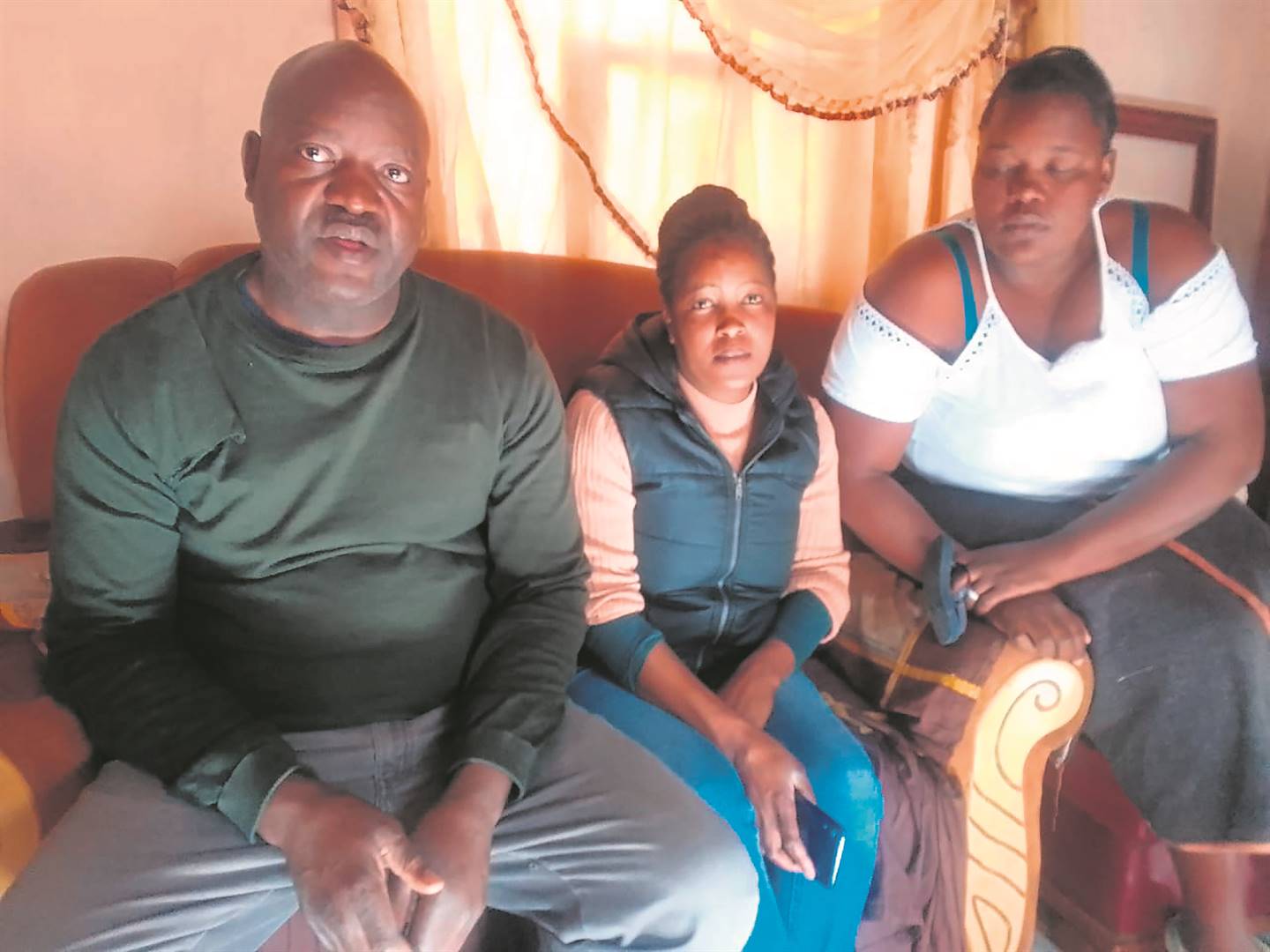 Uncle Gabriel Mpande, aunt Wendy Mpande and aunt Tshifiwa Mpande from Brits, North West, want justice for the murder of Lebogang Mpande (inset). Lebogang was a mother of two children, aged five and three.  ­                              Photo by Raymond Morare