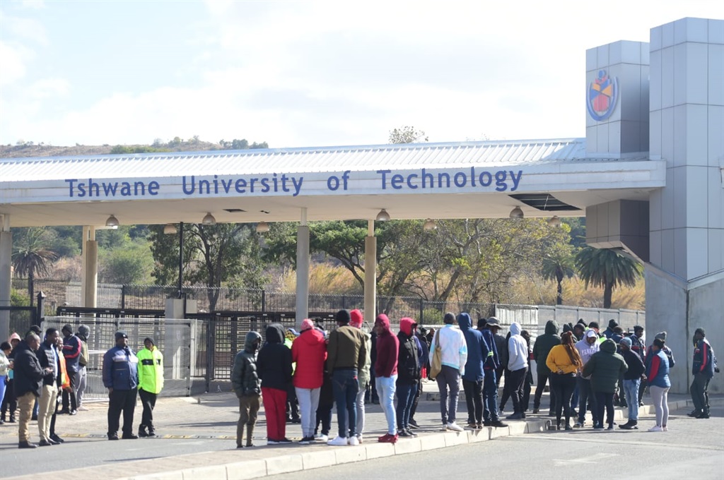 Tshwane University of Technology students protesting outside the main campus gate in Pretoria West. 