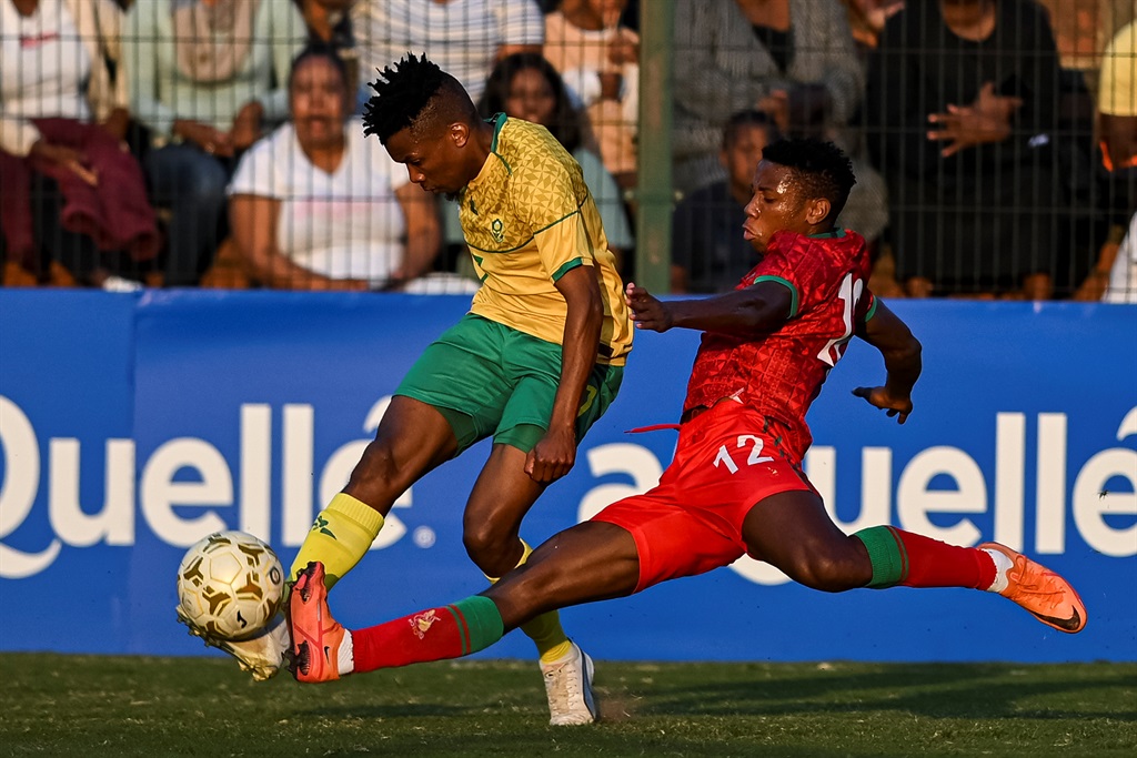 DURBAN, SOUTH AFRICA - JULY 16: Mokete Mogaila of South Africa and Alick Lungu of Malawi during the 2023 COSAFA Cup, 3rd place play-off match between Malawi and South Africa at King Zwelithini Stadium on July 16, 2023 in Durban, South Africa. (Photo by Darren Stewart/Gallo Images)