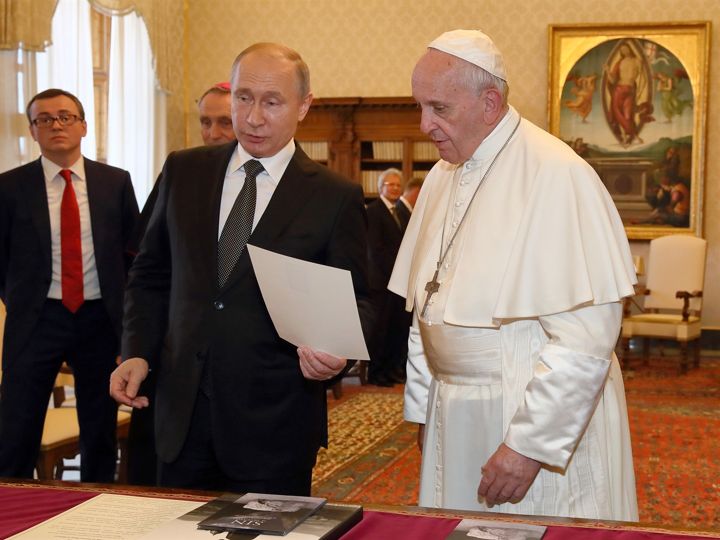 Pope Francis exchanges gifts with Russia's President Vladimir Putin during an audience at the Apostolic Palace on July 04, 2019 in Vatican City, Vatican. Photo by Vatican Pool/Getty Images