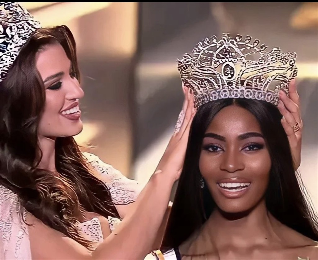 Miss South Africa, Lalela Mswane, is crowned Miss Supranational by her predecessor, Namibia's Chanique Rabe.