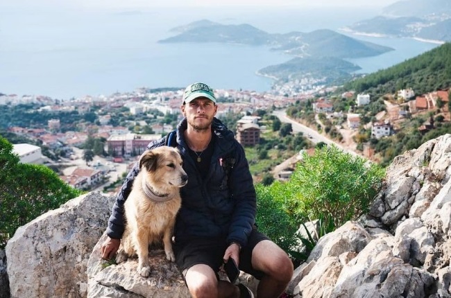 Tom Turcich and his plucky Australian Shepherd, Savannah, spent seven years trekking around the globe. (PHOTO: Instagram/ TheDogWalk)
