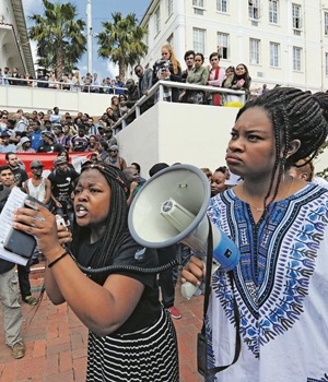 Members of activist student groups Open Stellenbosch and Rhodes Must Fall join forces in a protest march at the University of Stellenbosch. PHOTO: Leanne Stander
