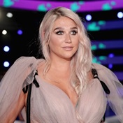 Kesha describes herself as 'not gay and not straight' as she celebrates Pride