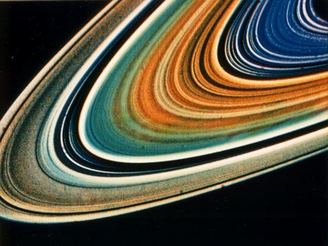 Saturn's rings are shown in false colour in a picture taken by a Voyager probe on August 23, 1981. NASA