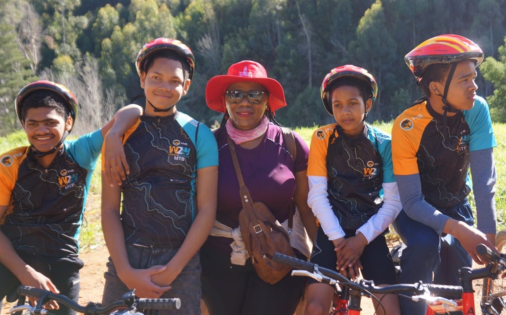 Thuli Madonsela and a group of young cyclist from 