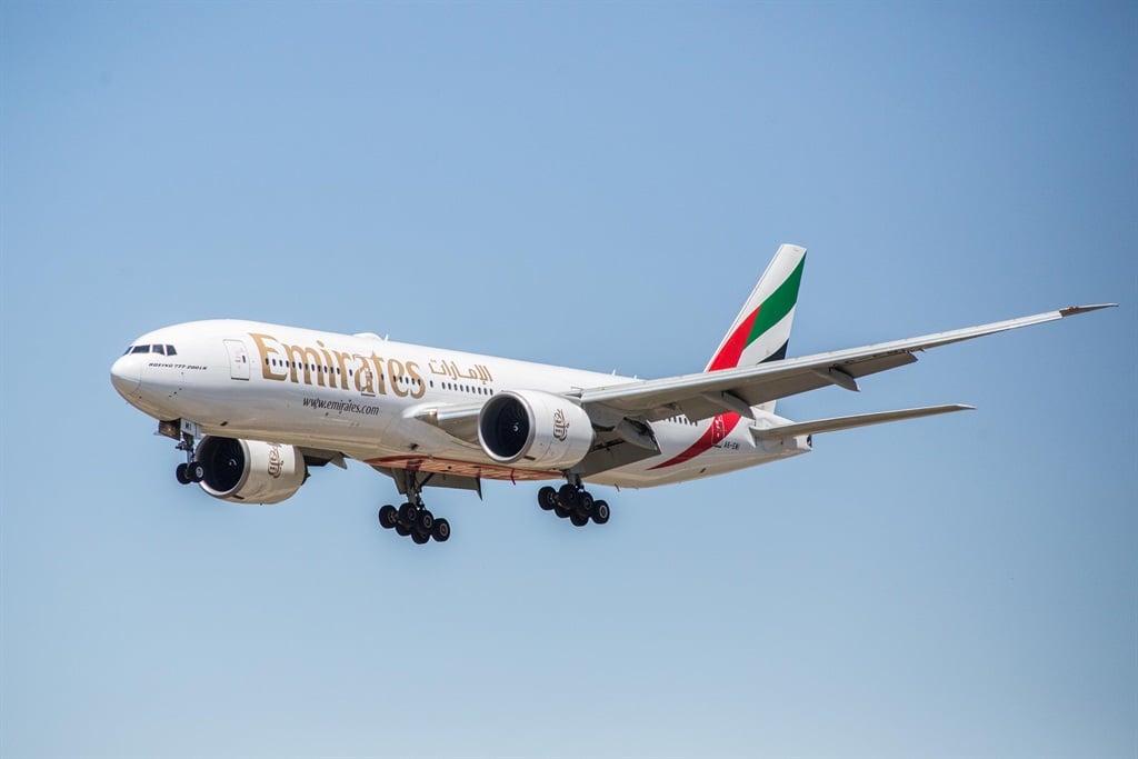 Emirates Airline, Boeing 777-300ER airplane is seen landing at El Prat Airport. (Photo by Thiago Prudencio/SOPA Images/LightRocket via Getty Images)