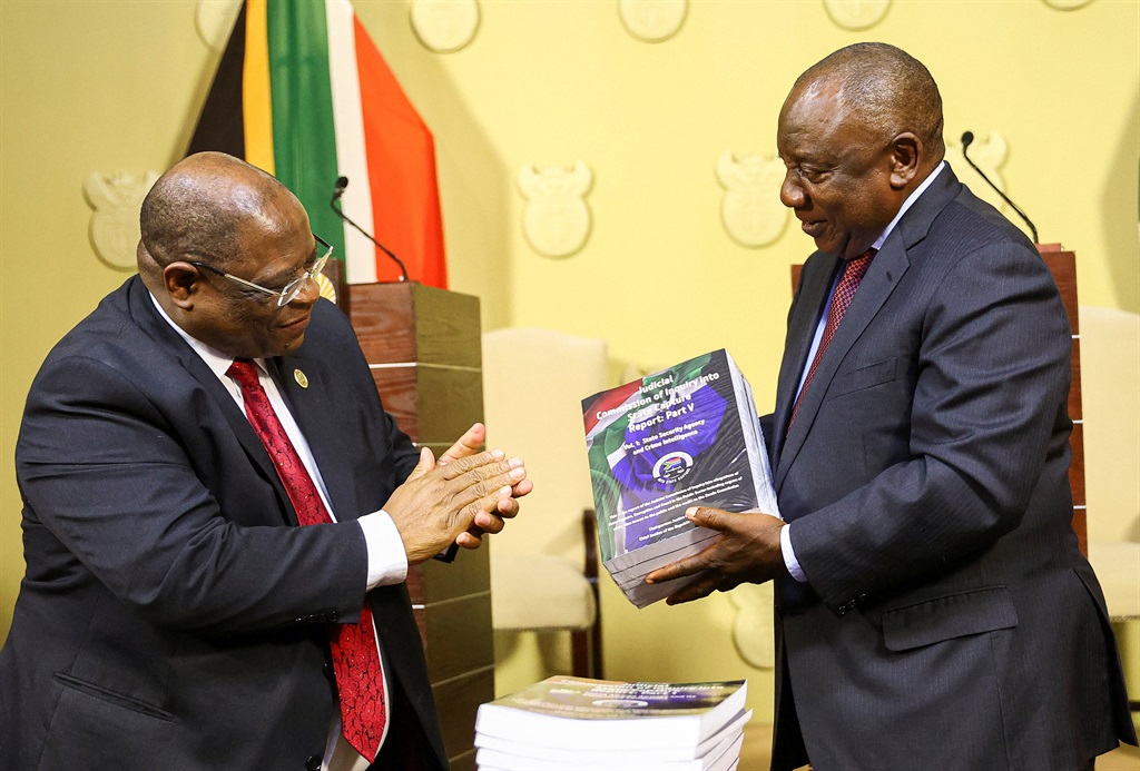 President Cyril Ramaphosa receives the final state capture report from Chief Justice Raymond Zondo on Wednesday. Photo: Siphiwe Sibeko/Reuters