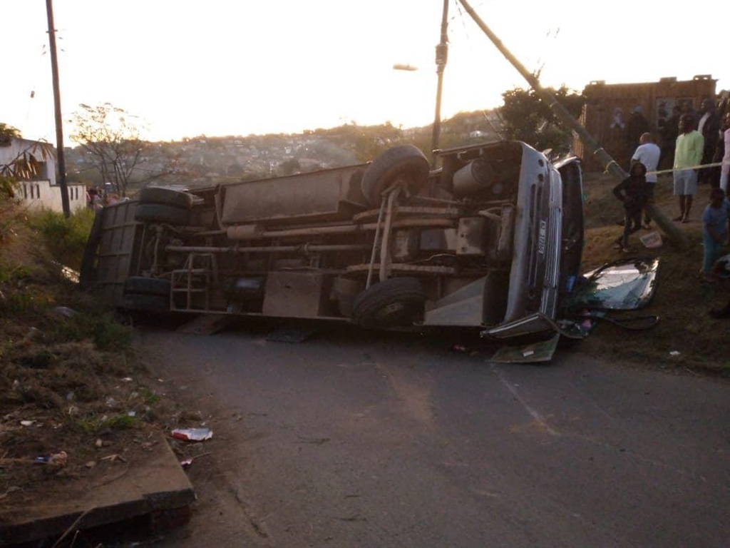 The bus that overturned at Waterloo, where people returning from a funeral got injured. Photo Supplied