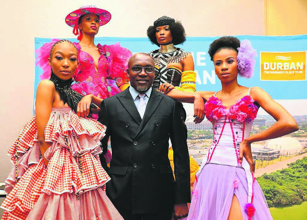 eThekwini Mayor, Mxolisi Kaunda (centre) posing with models (back row, from left) Asanda Mzondi and Neo Tshofela and (front row, from left) Khadija Makhanya and Sebolelo Hlabiwho, who will be showcasing the latest fashion trends at the Hollywoodbets Durban July this weekend.