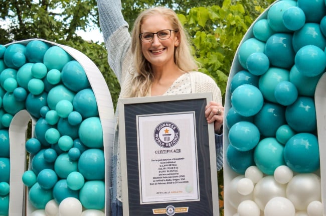 Woman holds record for largest breasts