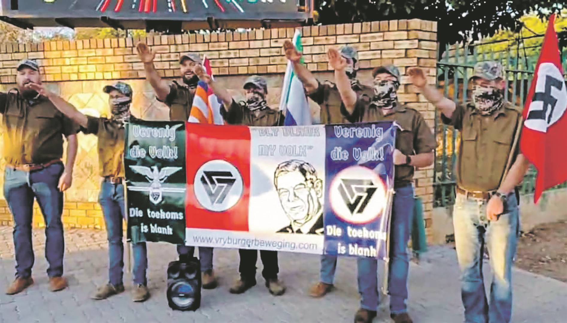 White supremacists The far-right Vryburger movement imitates the Nazi salute at Rustenburg High School last week. Photo: Archives.
