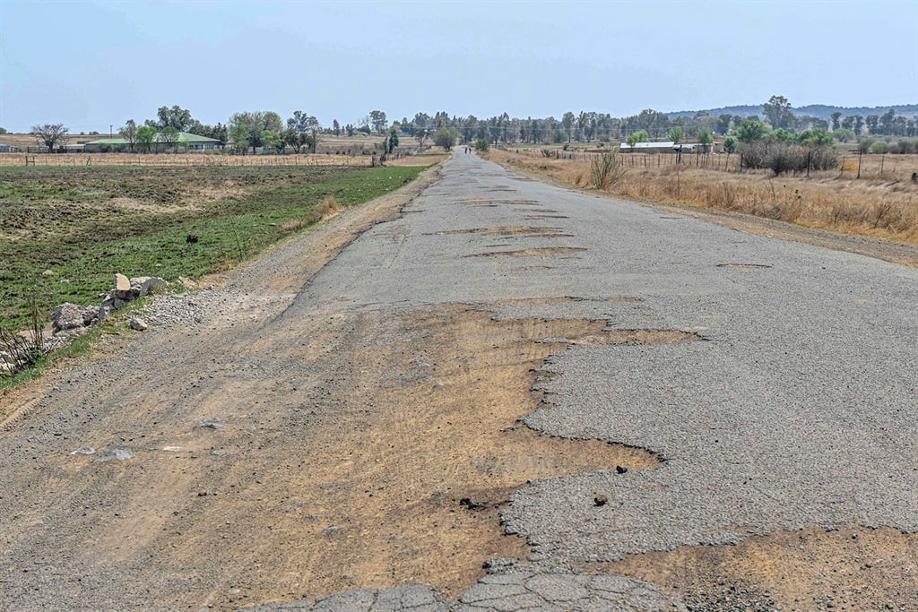 A road with potholes in Bloemspruit, Bloemfontein, South Africa. (Photo by Gallo Images/Volksblad/Mlungisi Louw)